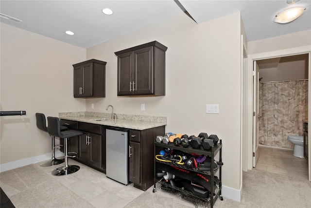 465 NW Gracewood Dr, Waukee, IA 50263 - indoor wet bar featuring refrigerator and recessed lighting