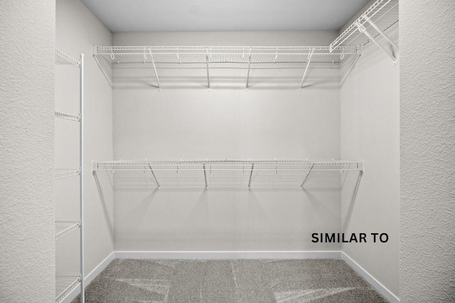 4404 Honey Bee Rdg, Des Moines, IA 50317 - spacious closet featuring carpet floors