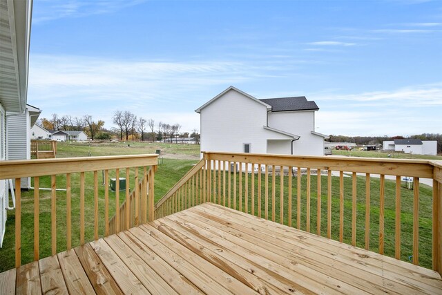 4408 Honey Bee Rdg, Des Moines, IA 50317 - wooden deck featuring a lawn