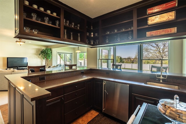 9257 Sugar Creek Dr, West Des Moines, IA 50266 - bar featuring a sink and refrigerator