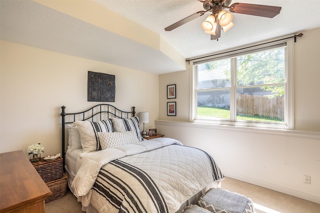 9257 Sugar Creek Dr, West Des Moines, IA 50266 - carpeted bedroom with a ceiling fan and baseboards