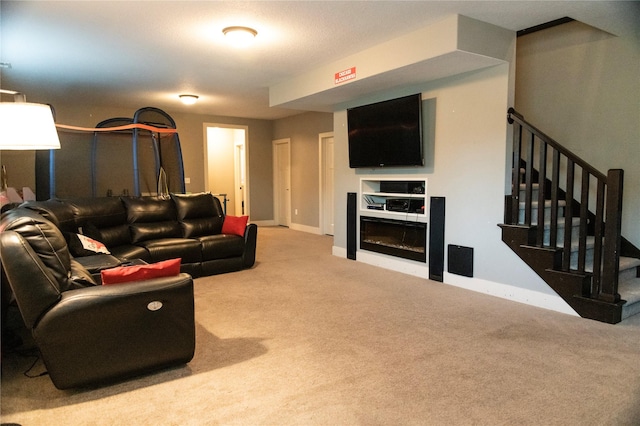 living room featuring carpet flooring, stairs, and baseboards