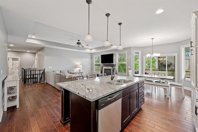 235 Emerson Ln, Waukee, IA 50263 - kitchen with dishwasher, a sink, dark wood-type flooring, a ceiling fan, and recessed lighting