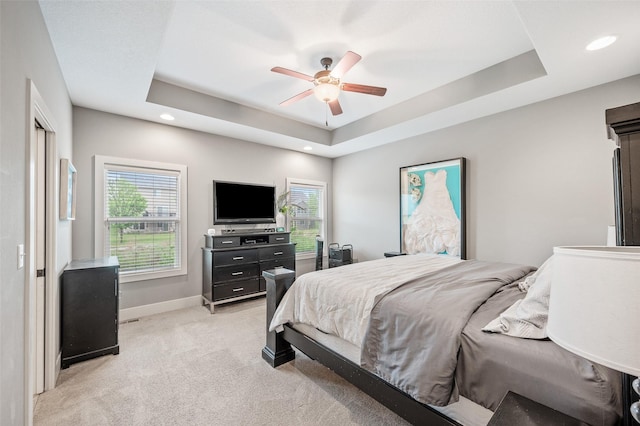 235 Emerson Ln, Waukee, IA 50263 - bedroom featuring light carpet, baseboards, a raised ceiling, recessed lighting, and ceiling fan