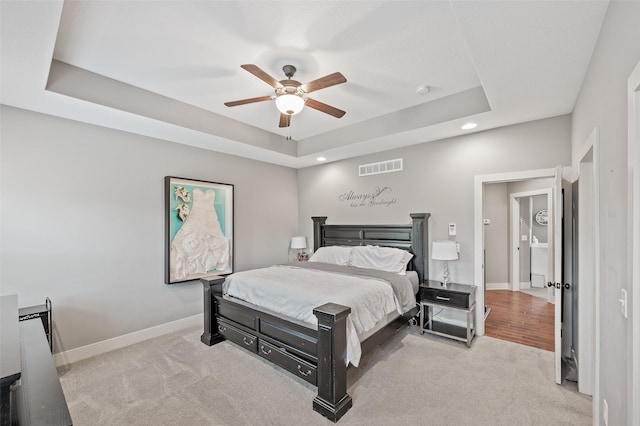 235 Emerson Ln, Waukee, IA 50263 - bedroom with carpet floors, baseboards, a tray ceiling, recessed lighting, and ceiling fan