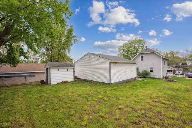 330 E 13th St N, Newton, IA 50208 - view of yard featuring a shed and an outbuilding