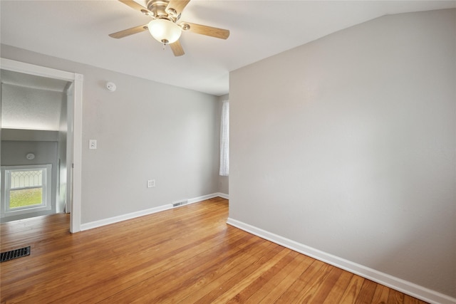 330 E 13th St N, Newton, IA 50208 - unfurnished room with light wood-type flooring, baseboards, a ceiling fan, and a smoke detector