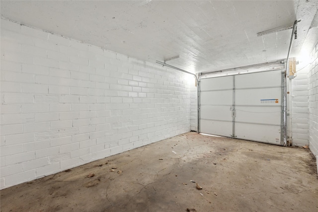 330 E 13th St N, Newton, IA 50208 - garage featuring concrete block wall