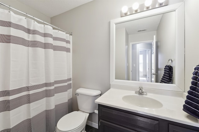 full bathroom with vanity, toilet, and a shower with curtain