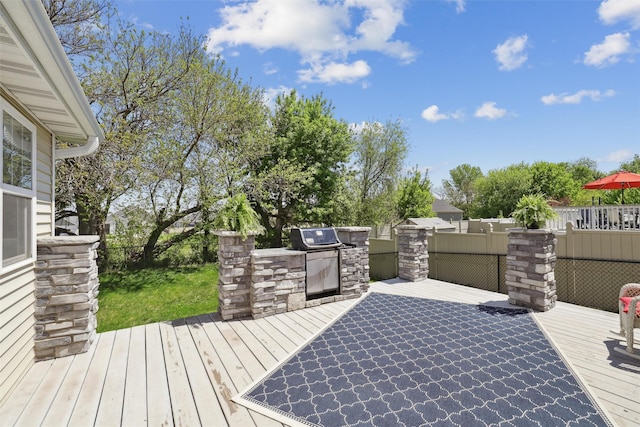 wooden deck with exterior kitchen