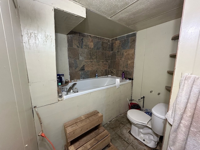 626 W Main St, Panora, IA 50216 - bathroom featuring toilet and tiled bath