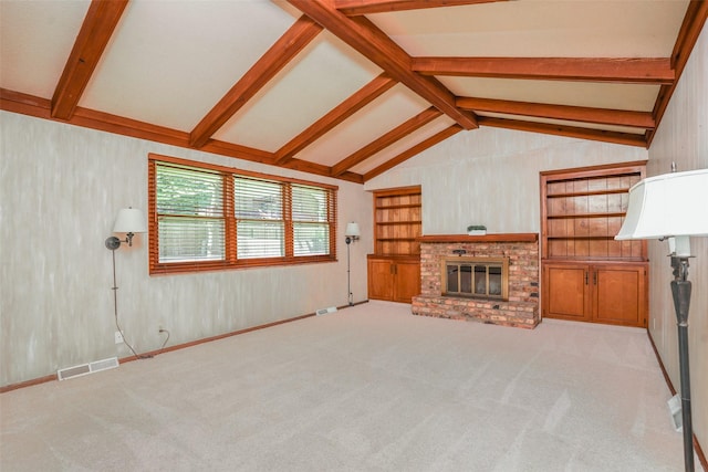 unfurnished living room with a brick fireplace and carpet