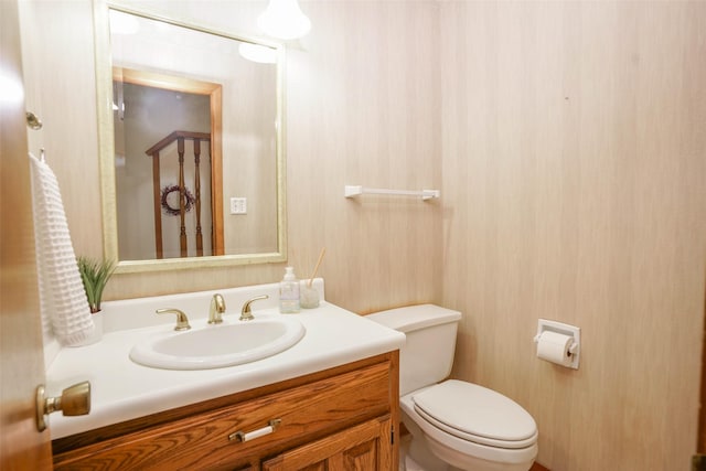 half bath with toilet and vanity