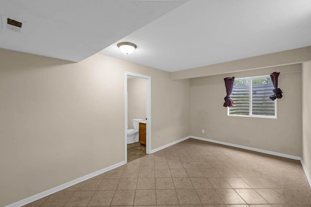 below grade area featuring baseboards
