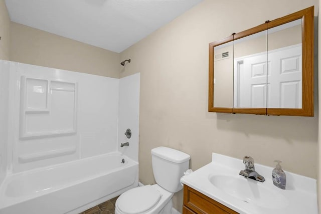 bathroom featuring tub / shower combination, toilet, and vanity