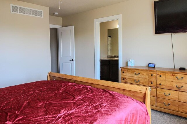 4917 Richmond Ave, Des Moines, IA 50317 - bedroom featuring carpet and ensuite bath