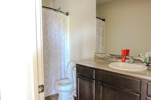 4917 Richmond Ave, Des Moines, IA 50317 - bathroom featuring vanity and toilet