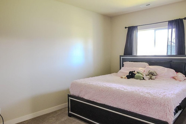 4917 Richmond Ave, Des Moines, IA 50317 - carpeted bedroom with baseboards