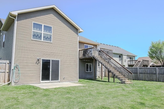 4917 Richmond Ave, Des Moines, IA 50317 - back of house with stairs and a deck