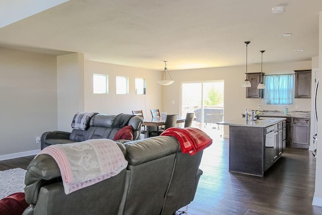 4917 Richmond Ave, Des Moines, IA 50317 - living area with dark wood-style floors, recessed lighting, and baseboards