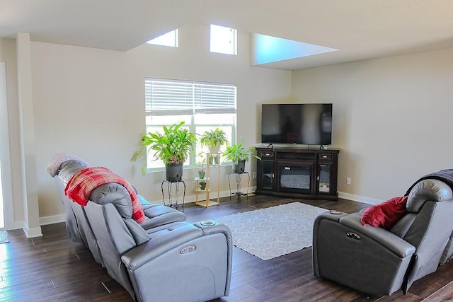 4917 Richmond Ave, Des Moines, IA 50317 - living area with dark wood-style floors and baseboards