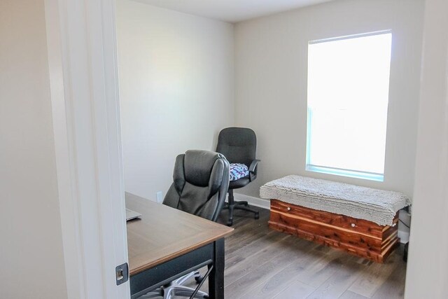 4917 Richmond Ave, Des Moines, IA 50317 - home office featuring wood finished floors and baseboards