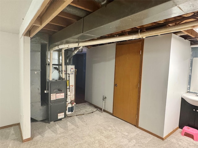 basement with water heater and light colored carpet