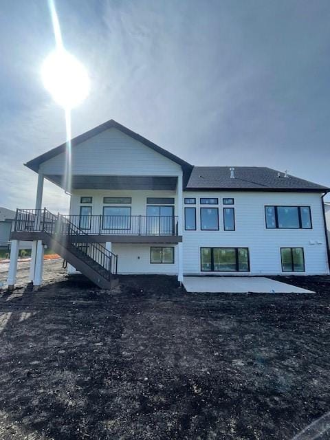 8236 Mahon Ct, Johnston, IA 50131 - back of house with stairs