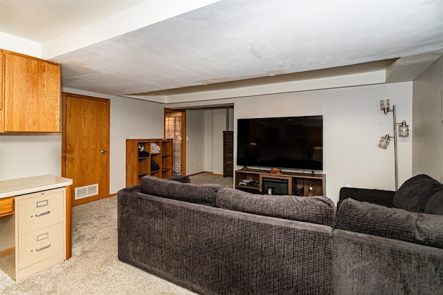 living area with light carpet