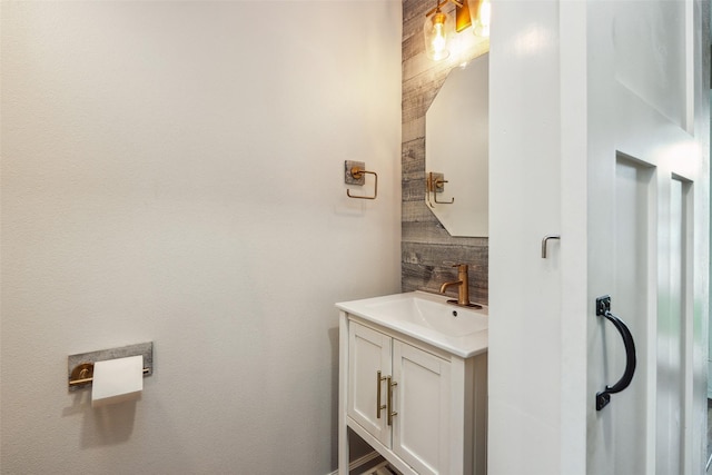 bathroom with vanity and tasteful backsplash
