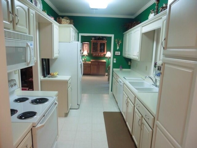 322 S Temple St, Osceola, IA 50213 - kitchen with white appliances, a sink, crown molding, light countertops, and light flooring