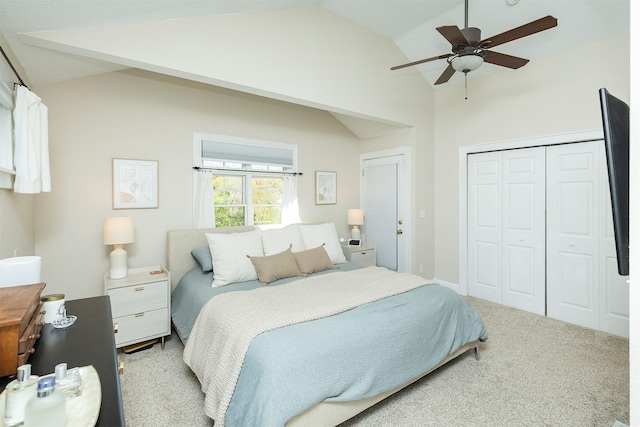 2620 35th St, Des Moines, IA 50310 - bedroom featuring lofted ceiling, light colored carpet, a closet, and ceiling fan
