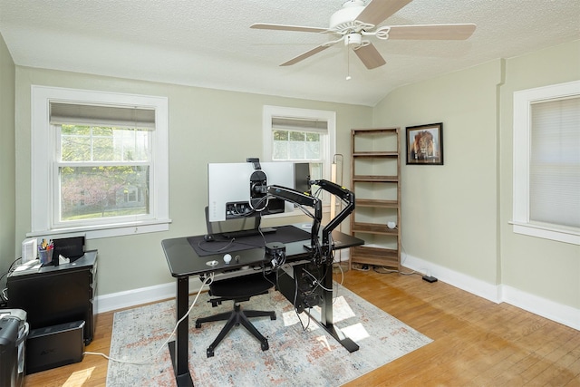 2620 35th St, Des Moines, IA 50310 - office featuring light wood finished floors, plenty of natural light, ceiling fan, baseboards, and a textured ceiling