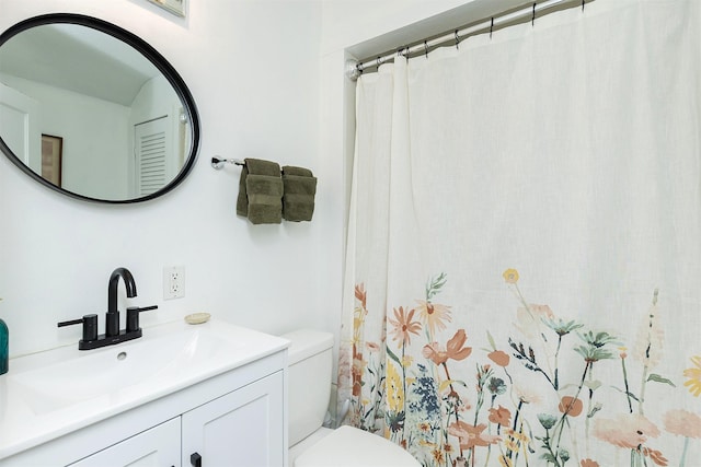 2620 35th St, Des Moines, IA 50310 - bathroom with toilet and vanity