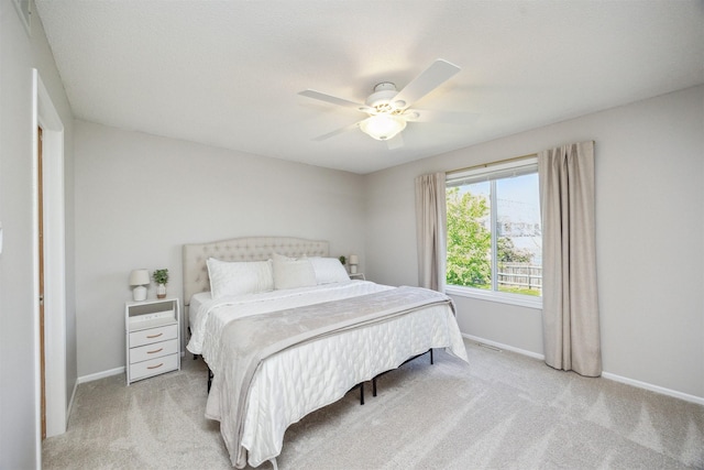 15919 Hawthorn Cir, Clive, IA 50325 - carpeted bedroom with baseboards and ceiling fan