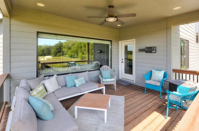 2113 NE Heritage Dr, Grimes, IA 50111 - deck with a ceiling fan and an outdoor hangout area
