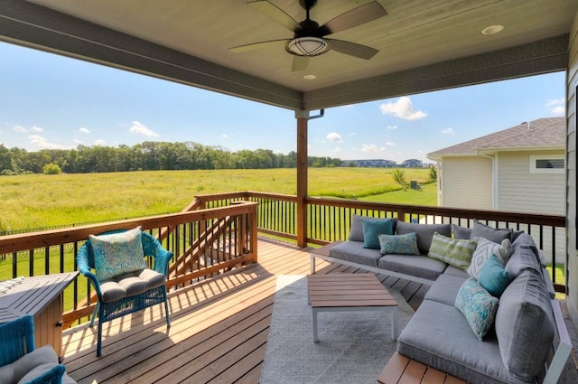 2113 NE Heritage Dr, Grimes, IA 50111 - deck featuring an outdoor living space, a view of rural / pastoral area, and ceiling fan