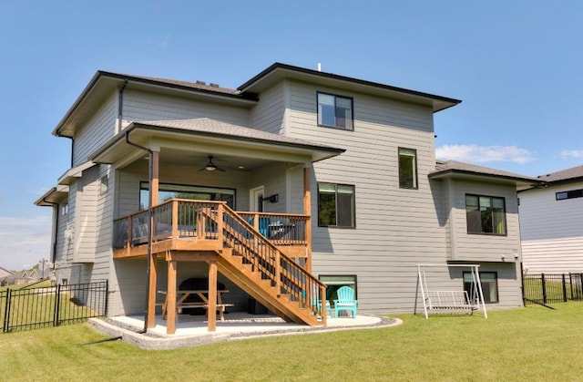 2113 NE Heritage Dr, Grimes, IA 50111 - back of house featuring ceiling fan, a fenced backyard, stairs, a patio area, and a deck