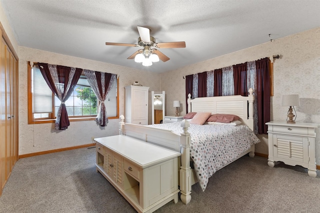 1608 W Lincoln Way, Marshalltown, IA 50158 - bedroom with carpet, a ceiling fan, baseboards, wallpapered walls, and a textured ceiling