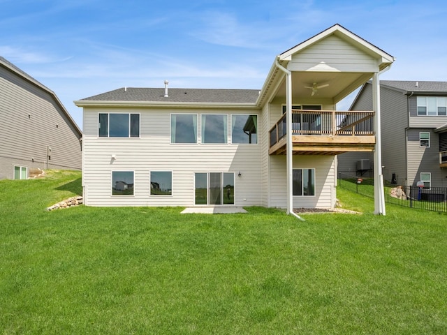 460 NW Gracewood Dr, Waukee, IA 50263 - back of house featuring ceiling fan and a yard