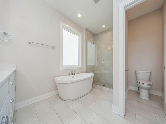 460 NW Gracewood Dr, Waukee, IA 50263 - bathroom featuring a stall shower, toilet, baseboards, a freestanding bath, and tile patterned floors