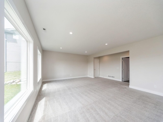 460 NW Gracewood Dr, Waukee, IA 50263 - unfurnished room with carpet floors, baseboards, and recessed lighting