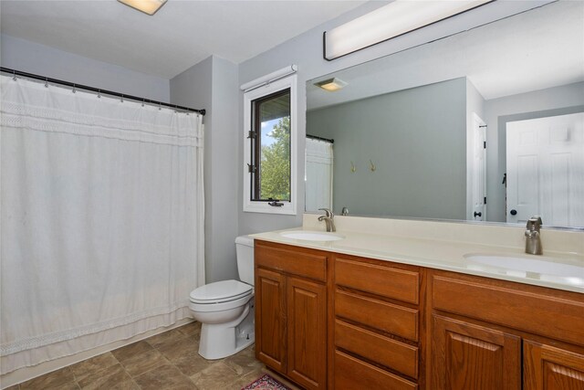 7422 Plum Dr, Urbandale, IA 50322 - full bathroom featuring double vanity, toilet, and curtained shower