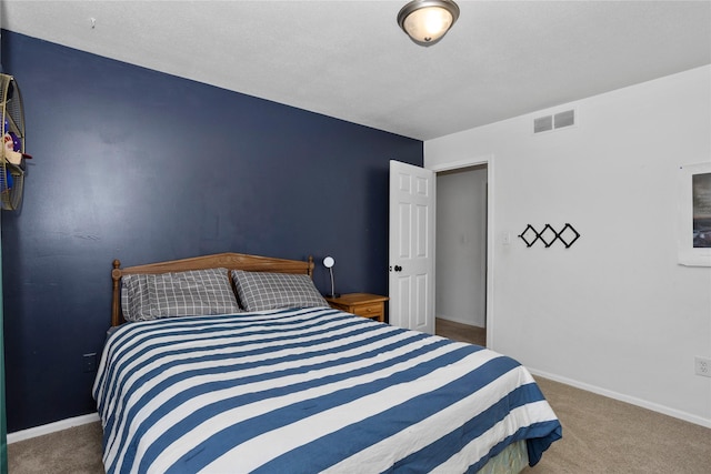 7422 Plum Dr, Urbandale, IA 50322 - carpeted bedroom featuring baseboards
