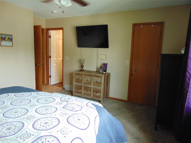 7120 Hickory Ln, Urbandale, IA 50322 - carpeted bedroom featuring a ceiling fan
