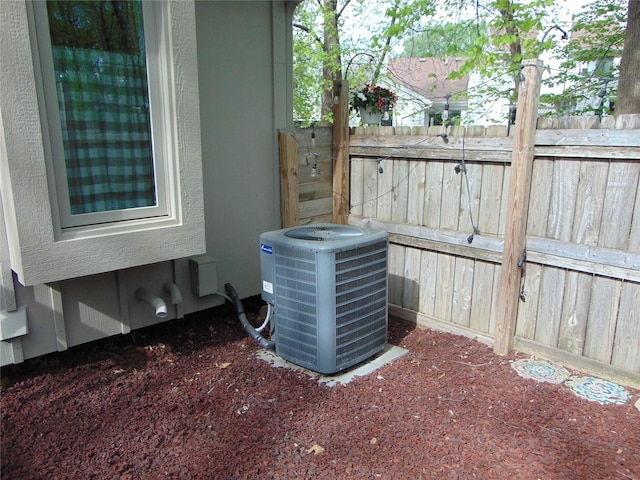 7120 Hickory Ln, Urbandale, IA 50322 - exterior view of central AC
