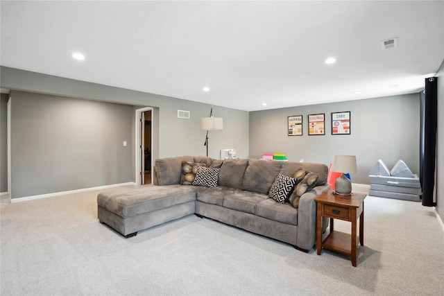 living area featuring carpet flooring, recessed lighting, and baseboards
