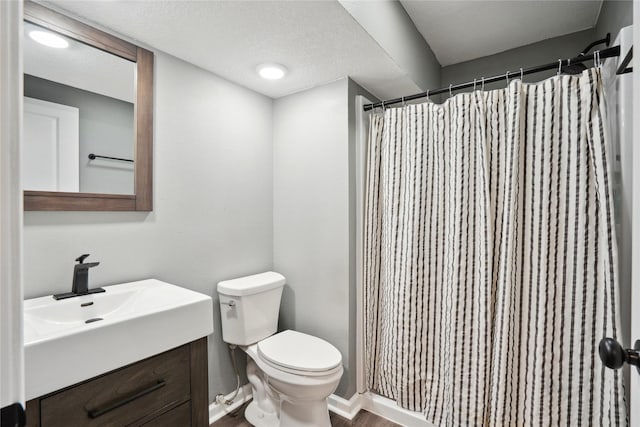 full bath featuring toilet, vanity, wood finished floors, and a shower with shower curtain
