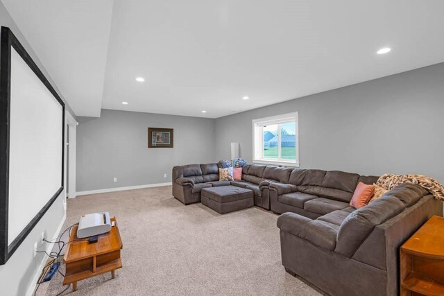 312 Evergreen Dr NW, Bondurant, IA 50035 - living room featuring recessed lighting, carpet flooring, and baseboards