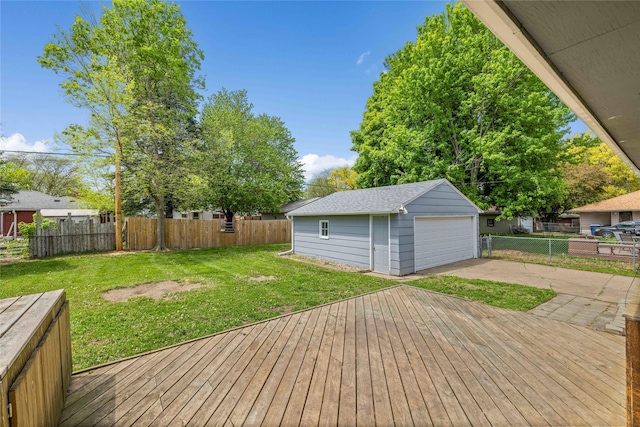 deck with an outbuilding and a garage